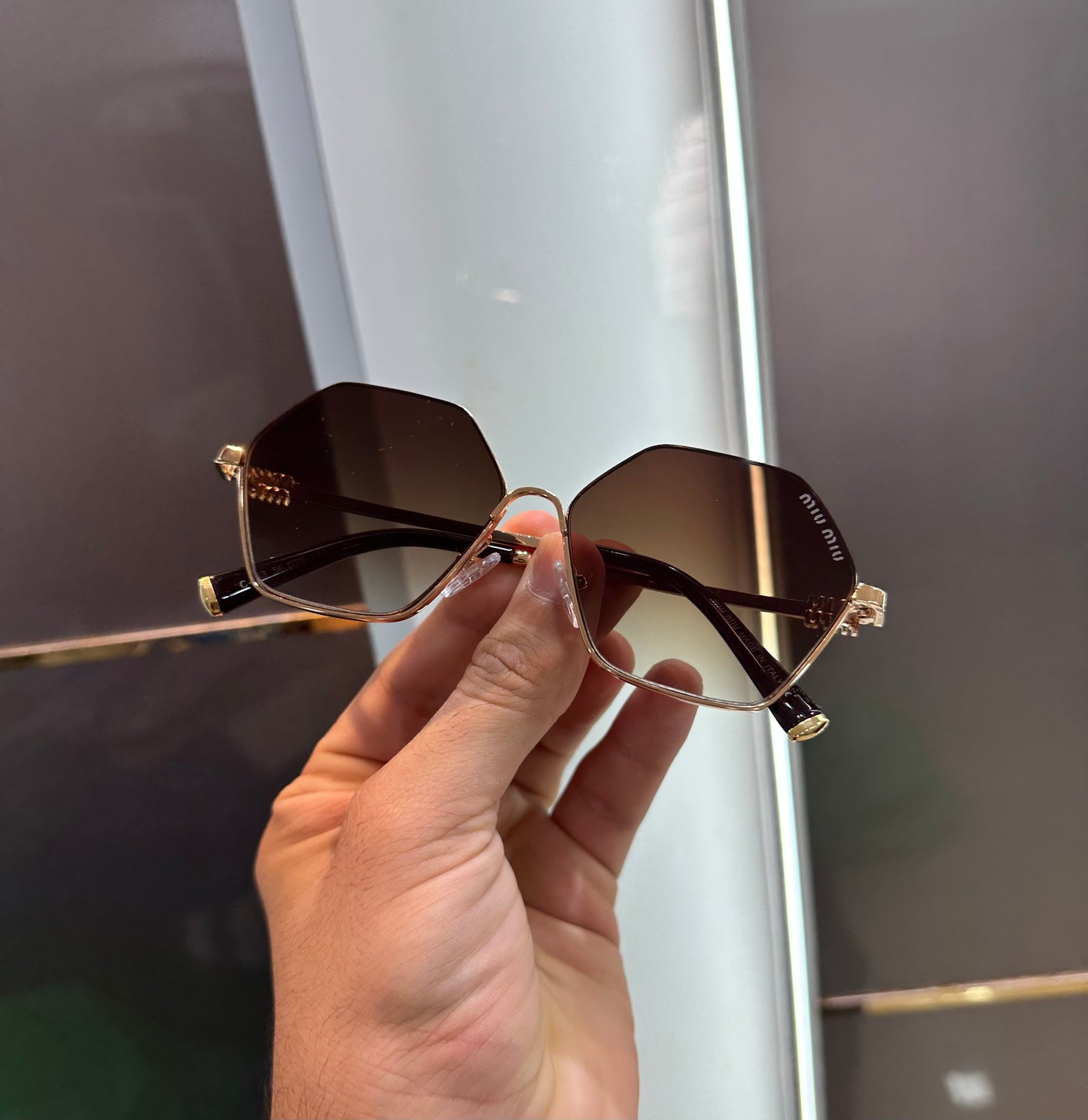 MIUMIU 653 Brown Ultimate Luxury Shade With Original Packaging
